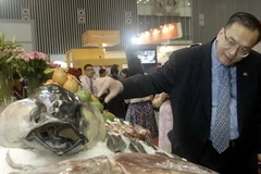 Tại Triển lãm Thực phẩm và Khách sạn 2011. (Ảnh: Thế Anh/TTXVN)