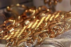 Vàng bày bán tại Manhattan, New York City. (Nguồn; AFP/TTXVN)