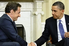 Tổng thống Mỹ Obama bắt tay người đồng cấp Sarkozy tại Nhà Trắng ngày 10/1. (Nguồn: Getty Images)