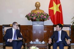 Phó Thủ tướng, Bộ trưởng Ngoại giao Phạm Bình Minh tiếp Thứ trưởng Ngoại giao Nga Igor. Morgulov. (Ảnh: Văn Điệp/TTXVN)
