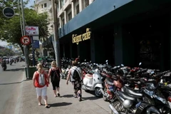 Xe máy được sắp xếp trật tự ngăn nắp hơn tại tuyến đường Tôn Đức Thắng, quận 1. (Ảnh: An Hiếu/TTXVN)