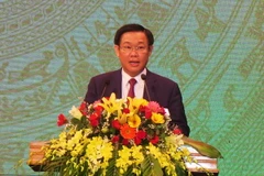 Phó Thủ tướng Vương Đình Huệ phát biểu tại Lễ kỷ niệm. (Ảnh Phan Quân/Vietnam+)