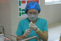 Đẩy nhanh tiến độ tiêm vaccine phòng COVID-19 mũi 4. (Ảnh: Hải Yến/TTXVN)