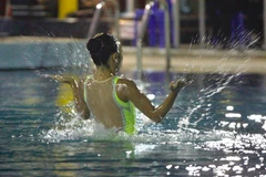 Vận động viên Huỳnh Vũ Nhu Giang đang biểu diễn. (Ảnh: Duy Trinh/PV TTXVN tại Nga)