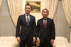 Đại sứ Đặng Hoàng Giang và Đại sứ Campuchia Sovann Ke.(Nguồn: baoquocte.vn)
