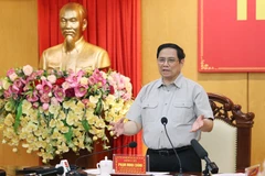 Thủ tướng Phạm Minh Chính làm việc với lãnh đạo chủ chốt tỉnh Hà Tĩnh. (Ảnh: Dương Giang/TTXVN)