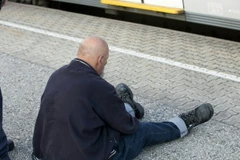 Nghi phạm bị bắt giữ tại hiện trường vụ tấn công. (Nguồn: AFP/TTXVN)