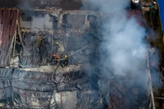 Hiện trường vụ cháy tại công ty xốp Khang Trang thuộc cụm công nghiệp Hapro (Gia Lâm, Hà Nội). (Ảnh: Hoài Nam/Vietnam+)