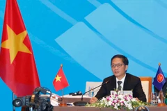 Bộ trưởng Trần Tuấn Anh chủ trì hội nghị tại đầu cầu Hà Nội. (Ảnh: Trần Việt/TTXVN)