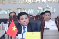 Bộ trưởng Bộ Kế hoạch và Đầu tư chủ trì và phát biểu tại hội nghị. (Ảnh: Danh Lam/TTXVN)