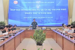 Thiếu tướng Nguyễn Trường Thắng, Tư lệnh Bộ Tư lệnh Thành phố Hồ Chí Minh, Phó Chủ tịch thường trực Hội đồng Nghĩa vụ quân sự Thành phố chủ trì phiên họp. (Ảnh: TTXVN phát)