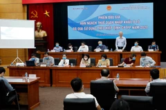 Quang cảnh phiên đấu giá. (Ảnh: Trần Việt/TTXVN)