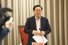 Bí thư Thành ủy Vương Đình Huệ chủ trì buổi làm việc. (Ảnh: Văn Điệp/TTXVN)