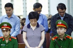 Bị cáo Châu Thị Thu Nga nghe tuyên án. (Ảnh: An Đăng/TTXVN)