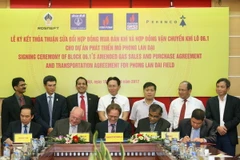 Quang cảnh lễ ký. (Ảnh: Minh Hiền/Vietnam+)