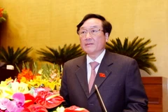 Viện trưởng Viện kiểm sát nhân dân tối cao Nguyễn Hòa Bình trình bày Báo cáo công tác nhiệm kỳ 2011-2016.(Ảnh: An Đăng/TTXVN) 