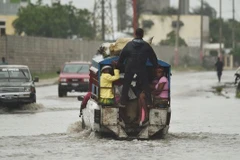 Hoàn lưu siêu bão Matthew gây mưa lớn, ngập lụt ở thủ đô Port-au-Prince, Haiti. (Nguồn: AFP)