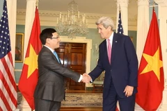 Phó Thủ tướng, Bộ trưởng Ngoại giao Phạm Bình Minh hội đàm với Ngoại trưởng Mỹ J.Kerry . (Ảnh: Thanh Tuấn/TTXVN)