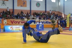 Các võ sinh Vovinam thi đấu nội dung đối kháng. (Ảnh: Nguyễn Quang Hồng/TTXVN)
