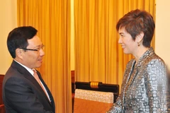 Phó Thủ tướng, Bộ trưởng Ngoại giao Phạm Bình Minh tiếp bà Josephine Teo, Quốc vụ khanh cao cấp Văn phòng Thủ tướng Singapore. (Ảnh: Nguyễn Khang/TTXVN) 