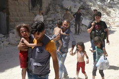 Người dân Syria rút khỏi thành phố Aleppo (Nguồn: AFP)