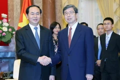 Chủ tịch nước Trần Đại Quang tiếp Chủ tịch ADB Takehiko Nakao. (Ảnh: Nhan Sáng/TTXVN) 
