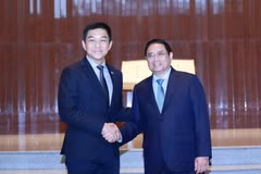 Thủ tướng Phạm Minh Chính hội kiến Chủ tịch Quốc hội Singapore Tan Chuan-Jin. (Ảnh: Dương Giang/TTXVN)
