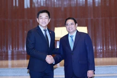 Thủ tướng Phạm Minh Chính hội kiến Chủ tịch Quốc hội Singapore Tan Chuan-Jin. (Ảnh: Dương Giang/TTXVN)