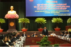 Bí thư Thành ủy Thành phố Hồ Chí Minh Đinh La Thăng phát biểu tại Hội nghị. (Ảnh: Hoàng Hải/TTXVN)