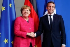 Thủ tướng Đức Angela Merkel và Tổng thống Pháp Emmanuel Macron. (Nguồn: Reuters) 