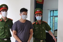 Bị can Ngô Văn Thắng bị Công an Vĩnh Phúc bắt giữ . (Nguồn: Tuổi Trẻ)