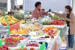 Người dân mua hàng trong siêu thị ở thành phố Yên Đài, tỉnh Sơn Đông, Trung Quốc ngày 11/5/2021. (Ảnh: THX/TTXVN)