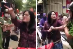 Người phụ nữ lăng mạ chiến sỹ công an - Ảnh cắt từ clip. (Nguồn: Tuổi Trẻ)