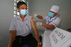 Tiêm vaccine COVID-19. (Ảnh: Duy Khương/TTXVN)