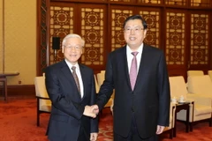 Tổng Bí thư Nguyễn Phú Trọng hội kiến Ủy viên Thường vụ Bộ Chính trị, Ủy viên trưởng Ủy ban Thường vụ Đại hội Đại biểu Nhân dân toàn quốc Trung Quốc (Chủ tịch Quốc hội) Trương Đức Giang. (Ảnh: Trí Dũng/TTXVN)