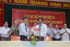 Quang cảnh lễ ký kết. (Ảnh: Ngọc Thiện/TTXVN)