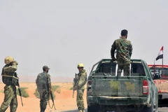 Quân đội Syria trong chiến dịch truy quét IS ở tỉnh Deir Ezzor ngày 4/9. (Nguồn: AFP/TTXVN)