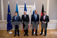 Ngoại trưởng các nước thuộc Nhóm Bộ tứ Normandy sau cuộc đàm phán ở Munich ngày 18/2. (Nguồn: AFP/TTXVN)