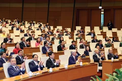 Các đồng chí lãnh đạo, nguyên lãnh đạo Đảng, Nhà nước và đại biểu tại lễ phiên bế mạc Kỳ họp thứ 7, Quốc hội Khóa XV. (Ảnh: Thống Nhất/TTXVN)