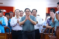 Thủ tướng Phạm Minh Chính đến dự hội nghị tiếp xúc cử tri thành phố Cần Thơ. (Ảnh: Dương Giang/TTXVN)