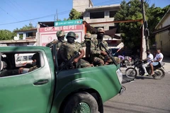 Lực lượng vũ trang Haiti tuần tra ở Port-au-Prince ngày 9/12 sau vụ thảm sát kinh hoàng. (Nguồn: Reuters)