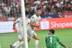 Thái Lan ngược dòng hạ Singapore để sớm vào bán kết AFF Cup 2024. (Nguồn: CNA)