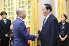 Chủ tịch nước Trần Đại Quang tiếp ông Yoshihiko Nakagaki. (Ảnh: Nhan Sáng/TTXVN)
