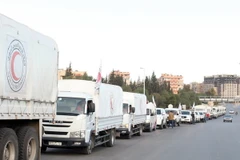 Xe chở hàng cứu trợ tới thị trấn Madaya and al-Zabadani gần Damascus, Syria. (Nguồn: EPA/TTXVN)