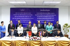 Quang cảnh lễ ký kết. (Ảnh: Phạm Kiên/Vietnam+)