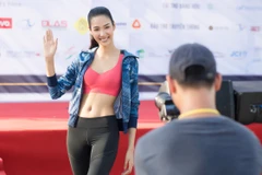 Á hậu Hoàng Thùy tham gia chương trình “Run To Future 2018.” (Ảnh: Phan Thành Nhân)