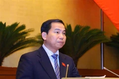 Chủ nhiệm Ủy ban Tài chính, Ngân sách của Quốc hội Lê Quang Mạnh trình bày Báo cáo giải trình, tiếp thu, chỉnh lý dự thảo Nghị quyết về Phương án Phân bổ Ngân sách Trung ương năm 2024. (Ảnh: Văn Điệp/TTXVN)