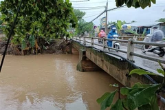 Tuyến kênh thoát nước được khơi thông nên đợt mưa từ ngày 13-17/11 vừa qua, khu vực đường Mẹ Suốt không bị ngập úng. (Ảnh: Quốc Dũng/TTXVN) 