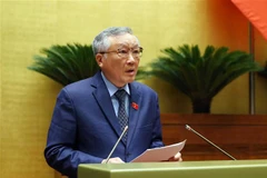 Chánh án Tòa án Nhân dân Tối cao Nguyễn Hòa Bình trình bày Báo cáo về việc thực hiện một số nghị quyết của Quốc hội khóa XIV về giám sát chuyên đề, chất vấn từ đầu nhiệm kỳ khóa XV đến hết Kỳ họp thứ 4. (Ảnh: An Đăng/TTXVN)
