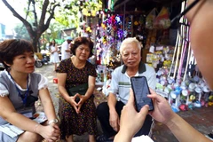 Ứng dụng phiếu điều tra điện tử trong Tổng điều tra Dân số và nhà ở năm 2019 giúp giảm đáng kể chi phí và thời gian tiến hành điều tra. (Ảnh: Danh Lam/TTXVN)